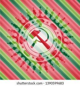 sickle and hammer icon inside christmas colors style emblem.