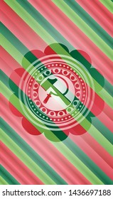 sickle and hammer icon inside christmas colors style badge.