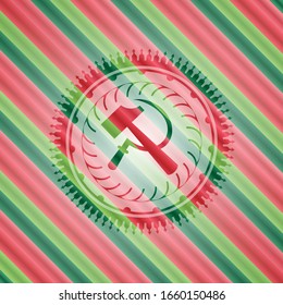 Sichel und Hammer Ikone in den Weihnachtsfarben Stil-Button.