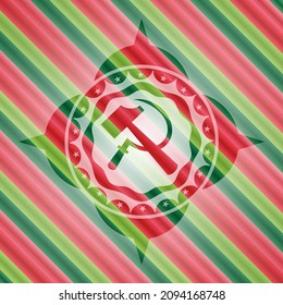 sickle and hammer icon inside christmas style badge.. 