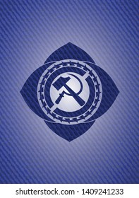 sickle and hammer icon inside emblem with jean texture
