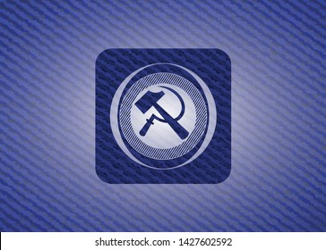 sickle and hammer icon inside emblem with jean texture