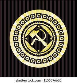 sickle and hammer icon inside gold badge