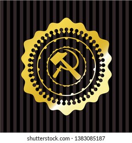 sickle and hammer icon inside gold shiny emblem