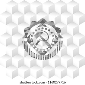 sickle and hammer icon inside grey emblem with cube white background