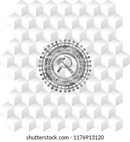 sickle and hammer icon inside grey badge with geometric cube white background
