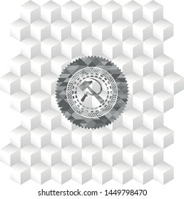 sickle and hammer icon inside grey emblem with cube white background