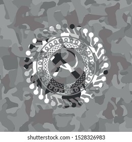 sickle and hammer icon inside grey camo texture