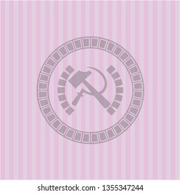 sickle and hammer icon inside pink icon or emblem