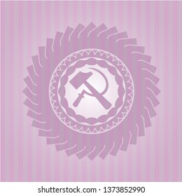 sickle and hammer icon inside pink icon or emblem