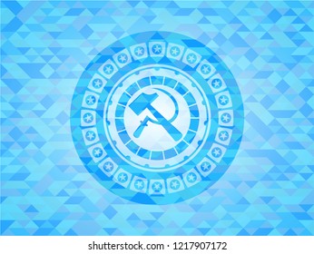 sickle and hammer icon inside realistic light blue mosaic emblem
