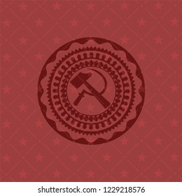 sickle and hammer icon inside realistic red emblem