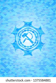 sickle and hammer icon inside realistic sky blue emblem. Mosaic background