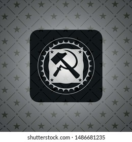 sickle and hammer icon inside realistic dark emblem