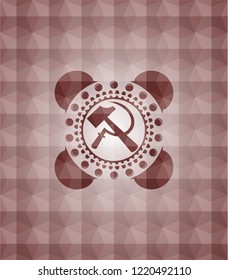 sickle and hammer icon inside red seamless emblem with geometric pattern background.