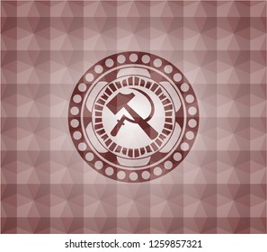 sickle and hammer icon inside red seamless emblem or badge with abstract geometric polygonal pattern background.