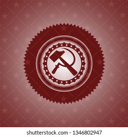 sickle and hammer icon inside red icon or emblem