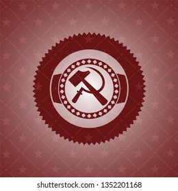 sickle and hammer icon inside red icon or emblem