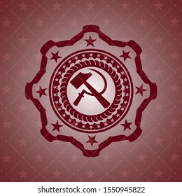 sickle and hammer icon inside red icon or emblem