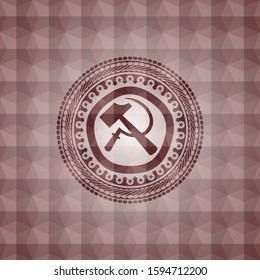 sickle and hammer icon inside red seamless polygonal badge.