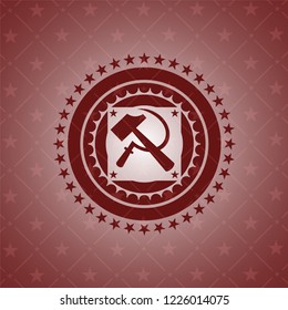 sickle and hammer icon inside retro style red emblem