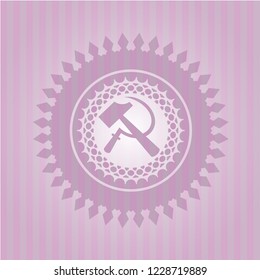 sickle and hammer icon inside retro pink emblem