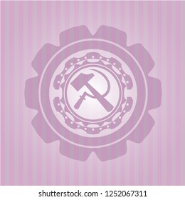sickle and hammer icon inside retro style pink emblem