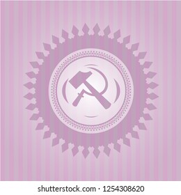 sickle and hammer icon inside retro pink emblem
