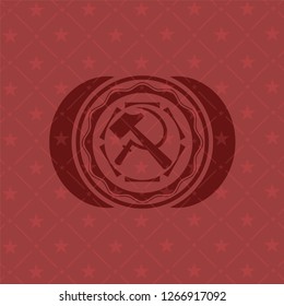 sickle and hammer icon inside retro style red emblem