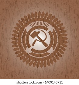 sickle and hammer icon inside retro style wood emblem