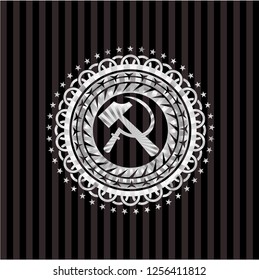 sickle and hammer icon inside silver shiny badge
