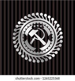 sickle and hammer icon inside silver shiny emblem