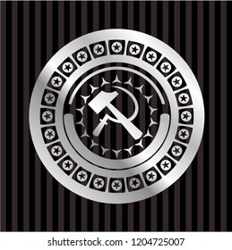 sickle and hammer icon inside silvery shiny emblem