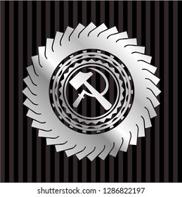sickle and hammer icon inside silvery shiny badge