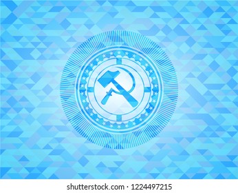 sickle and hammer icon inside sky blue emblem with mosaic ecological style background