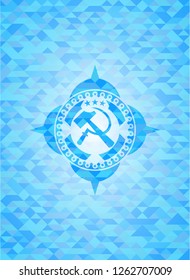 sickle and hammer icon inside sky blue emblem with mosaic ecological style background