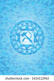 sickle and hammer icon inside sky blue emblem with mosaic ecological style background