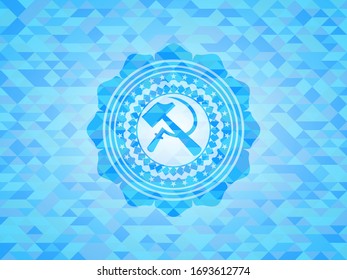 sickle and hammer icon inside sky blue emblem. Mosaic background