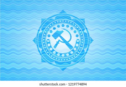 sickle and hammer icon inside water style emblem.