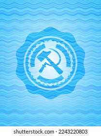 sickle and hammer icon inside water badge. 