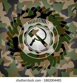 sickle and hammer icon on camouflaged pattern. 
