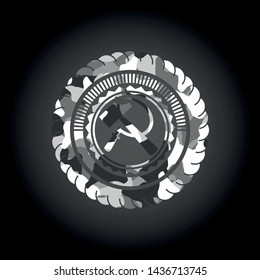 sickle and hammer icon on grey camo pattern