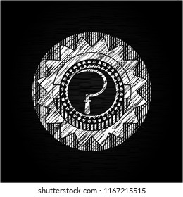 sickle icon drawn on a blackboard