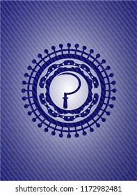 sickle icon inside badge with denim texture