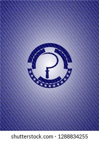 sickle icon inside badge with denim texture