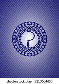 sickle icon inside badge with denim texture. 