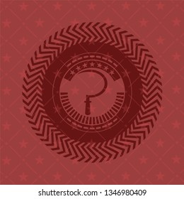 sickle icon inside badge with red background
