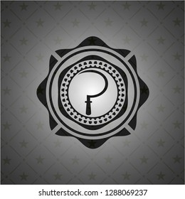 sickle icon inside black emblem