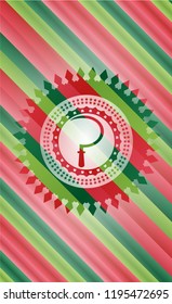 sickle icon inside christmas badge.