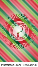 sickle icon inside christmas style emblem.